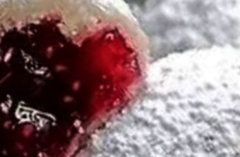 Raspberry-Filled Almond Snow Cookies