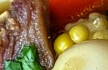 Beef Rib Soup with Carrots Corn and Radishes